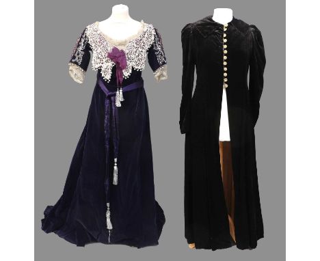 An Early 20th Century Purple Velvet Evening Dress with short sleeves trimmed with gathered silk cuffs, cutwork and laced deta