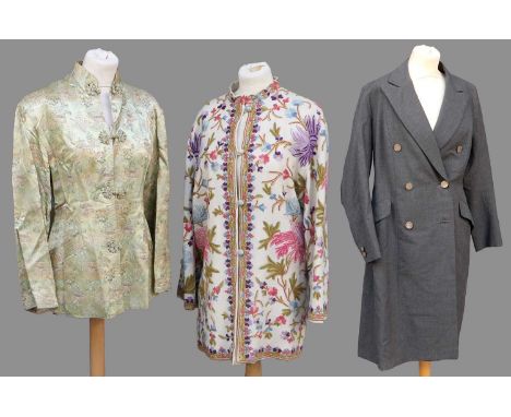 20th Century Costume comprising a decorative cream wool crewelwork embroidered jacket of floral design with button fastening,