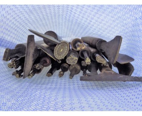 *Decorative finishing tools. A collection of twenty brass decorative finishing tools, comprising mostly centre and few corner