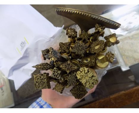 *Decorative finishing tools. A collection of twenty brass decorative finishing tools, late 20th century, comprising 19 centre