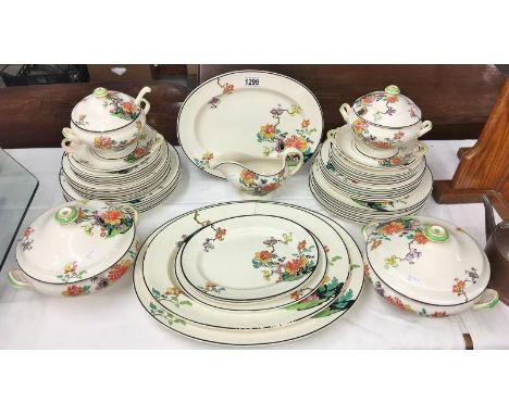 A collection of Copeland Spode Kymono 1932 dinnerware including plates, platters, tureens etc.