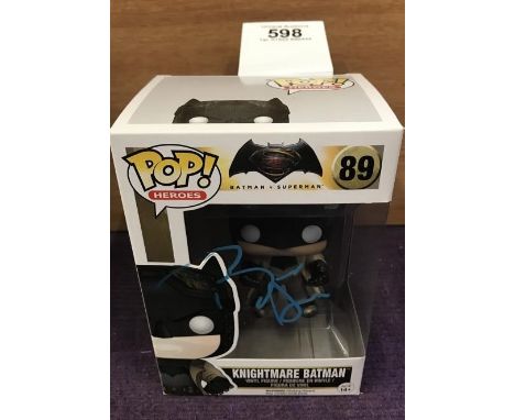 A signed by Ben Affleck Knightmare Batman Pop! vinyl figurine in box.