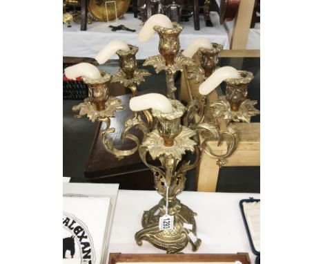A brass candelabra.