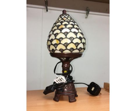 A table lamp with Tiffany style shade.