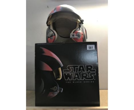 A boxed Star Wars The Black Series Poe Dameron helmet.