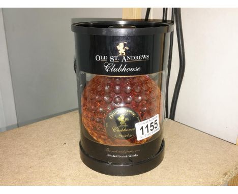 A boxed bottle in the shape of a golf ball 'Old St. Andrews Club House' blended Scotch whisky.