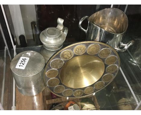 An interesting collection of pewter and metalware including tea caddy with liner, dragon design, Walker &amp; Hall bottle hol