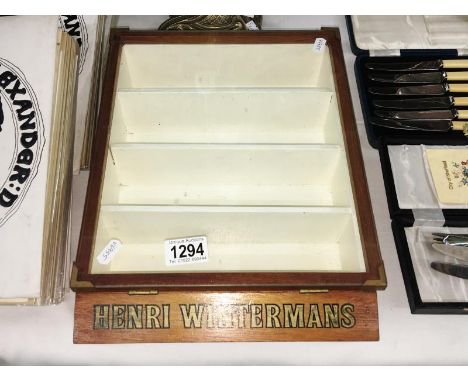 A Vintage Henri Winterman's shop cigar display cabinet.