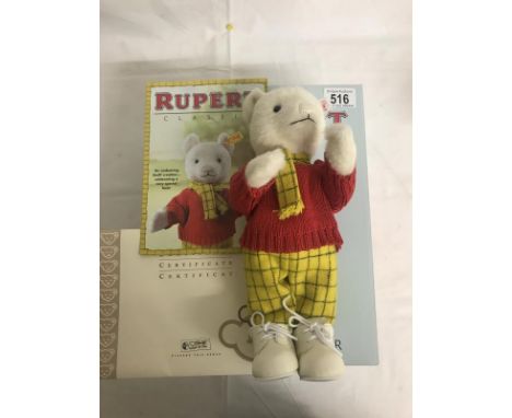 A Steiff Rupert bear in box with certificate.