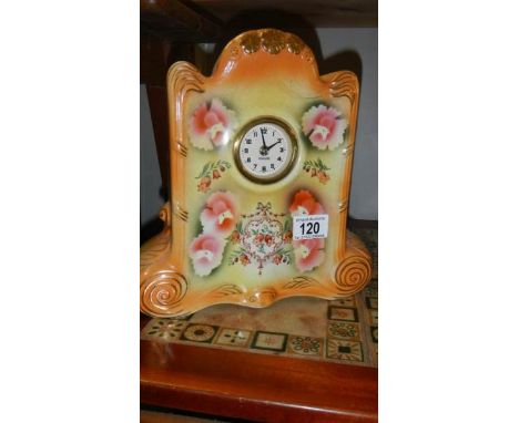 A ceramic mantel clock.
