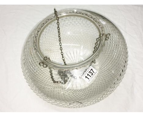 A large glass uplighter lamp shade.