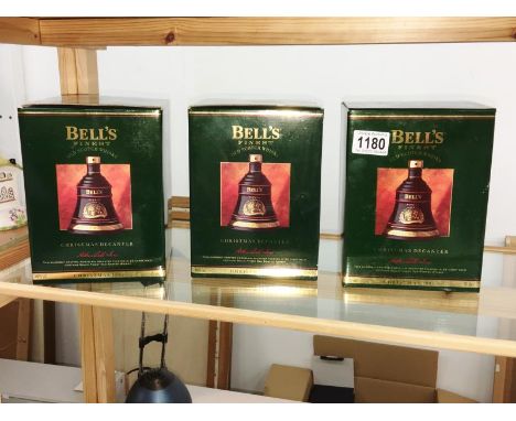 3 Bell's Finest Scotch whisky Christmas decanters with contents.
