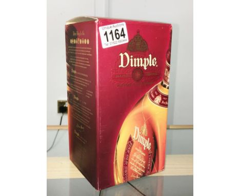 A boxed Dimple Fine Old Original 15yr blended Scotch whisky.