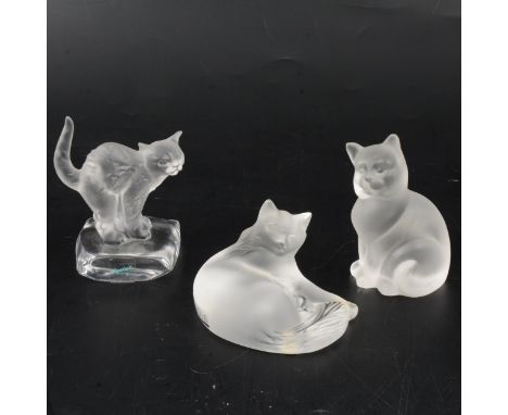 Lalique Crystal, Happy Cat, a frosted glass figure, engraved mark, 9cm long; and two other frosted glass cat figures, one by 