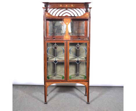 An English Art Nouveau mahogany and inlaid display cabinet, in the manner of Shapland and Petter of Barnstaple, the raised ba