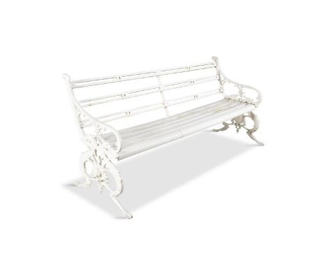 A VICTORIAN WHITE PAINTED CAST IRON THREE SEATER GARDEN BENCH, c.1880, the sides cast with opposing griffins and centred with