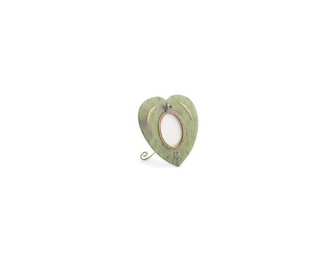 A RUSSIAN JADEITE, GOLD AND DIAMOND MOUNTED PHOTOGRAPH FRAME, struck with Fabergé mark, 84 Zoltniks, formed in the shape of a
