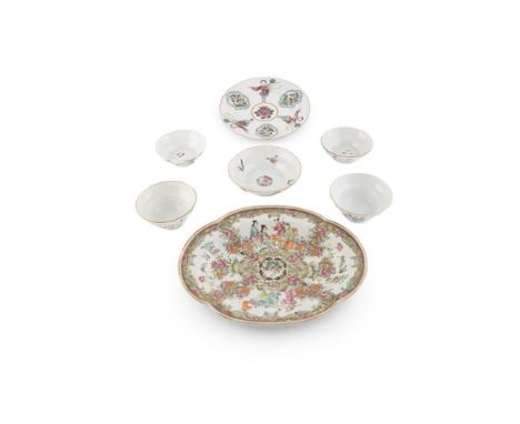 A CHINESE 'CANTON' PORCELAIN DISH, 19th century, of oval shape, filled with a central floral medallion and figural panels wit