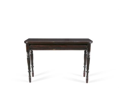 A VICTORIAN MAHOGANY RECTANGULAR SIDE TABLE, of compact proportions, the plain moulded top with rounded forecorners, above pu