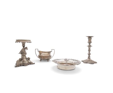 A COLLECTION OF SILVER PLATED WARE, comprising a circular decanter coaster with cast vine leaf border, with inset timber base