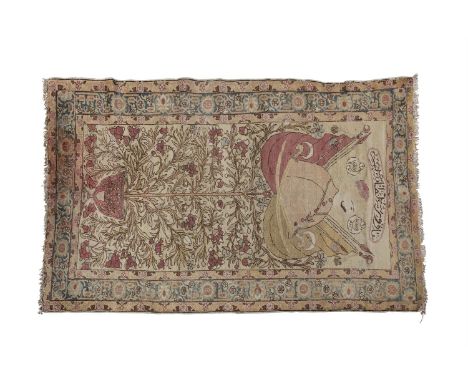 A PERSIAN WOOL PORTRAIT RUG, the central field woven in beige, blue and puce tones, decorated with a portrait of a sultan bel