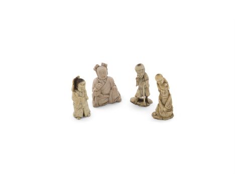 A COLLECTION OF JAPANESE IVORY NETSUKE AND OKIMONO, 19th century, comprising a carved group depicting a kneeling tradesman on