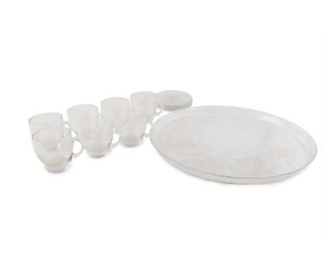 A LATE 19TH CENTURY BOHEMIAN GLASS CABINET SET, comprising a large circular tray; seven cups; and seven saucers, each engrave