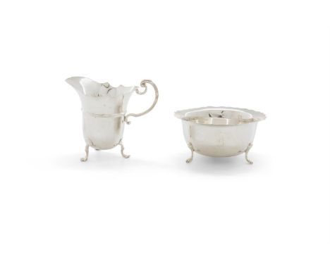 A VICTORIAN SILVER CREAM JUG AND SUGAR BOWL OF SIMILAR DESIGN, the creamer, London 1898, mark of William Hutton & Sons Ltd, t