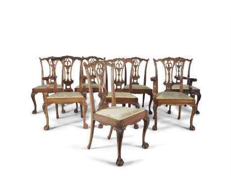 A SET OF EIGHT MAHOGANY CHIPPENDALE REVIVAL DINING CHAIRS, comprising two carvers and six single chairs, each with vase shape