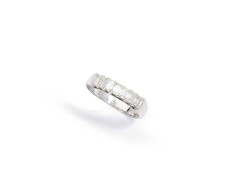 Bentley &amp; Skinner: A diamond seven-stone ring Set with seven cut-cornered step-cut diamonds to a platinum band, maker's m