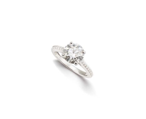 A diamond single-stone ring The brilliant-cut diamond, weighing 2.00ct, between brilliant-cut diamond shouldersAccompanied by