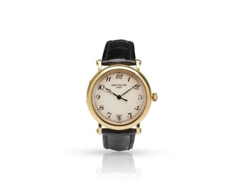 Y Patek Philippe: a gold wristwatch Calatrava model 5053J-001, originally purchased 2004, 18ct gold case with European conven