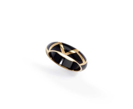 A French early 20th century onyx ring The onyx band with gold geometric motifs, French assay mark, maker's markDimensions:Rin