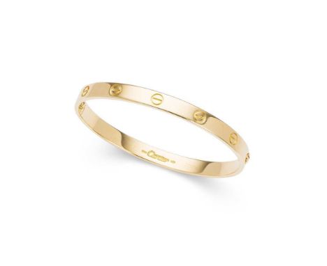Cartier: A 'Love' bangle The polished bangle with screw-head motifs, signed Cartier, numbered, in maker's pouchDimensions:Inn