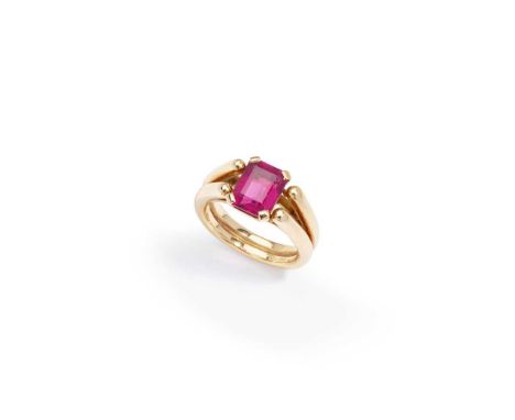 A pink tourmaline ring The cut-cornered step-cut pink tourmaline to a bifurcated band, French assay and maker's marks Dimensi