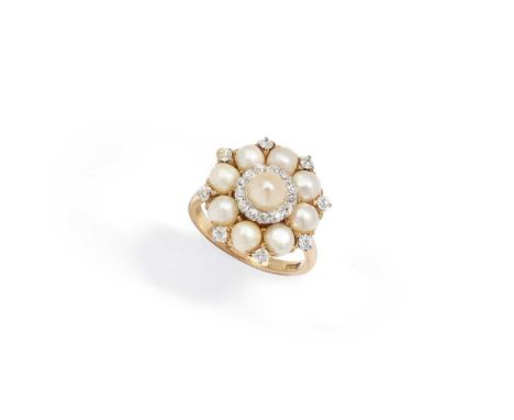 An early 20th century pearl and diamond cluster ring The central 5.3mm pearl and old-cut diamond cluster within a surround of