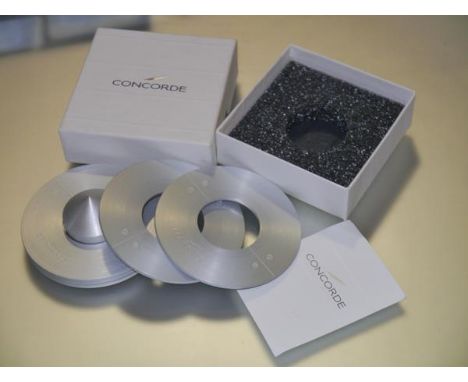 British Airways Concorde: a set of four aluminium coasters with spindle holder, each with felt backing, complete with complim