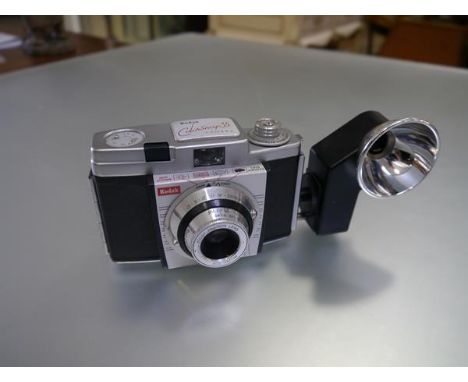 A Kodak Colorsnap 35 camera with Kodak Anaston lens mount 320 and flash