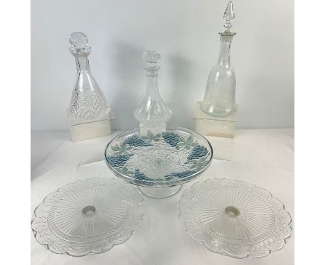3 vintage clear glass decanters together with 3 glass cake stands with pedestal bases. To include decanter with acid etched g