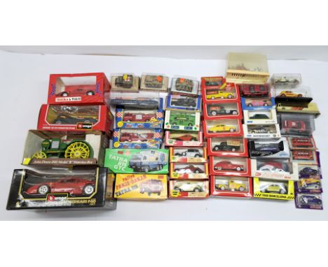 BBurago, Majorette, Polistil and similar a boxed mixed scale vehicle group comprising of; Military Vehicles, Motor Vehicles, 