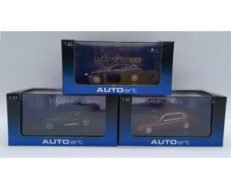 Autoart, a boxed 1:43 scale Jaguar group, to include; 53631 - Jaguar XK8 Couple 'Blue', 53501 - Jaguar C-Type 'Green', 53572 