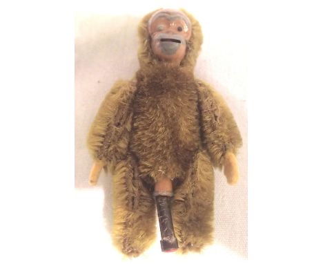 Miniature Steiff monkey with tongue stuck out. H: 8 cm, Paint loss to head and one eye is not black, fur is thread bare on li