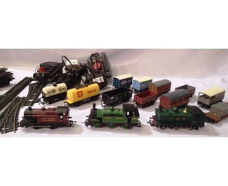 Three OO scale locomotives, ten wagon four wheel coach, plus track, controllers etc. Mostly in good condition, unboxed. P&amp