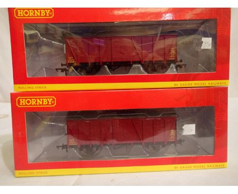 Two OO scale Hornby four wheel CCT vans, R6641 and R6641A, both in excellent condition, storage wear to boxes. P&amp;P Group 