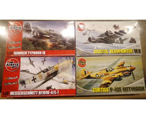 Four Airfix 1/72 aircraft kits to include Kittyhawk, Typhoon, Beaufighter and BF109E, all sealed boxes, as new. P&amp;P Group