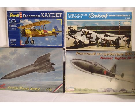 Four plastic kits to include three 1/72 B1-1 fighter, German Missile A4/V-2, Stearman Kaydet, plus 1/87 scale Junkers F13 Ros