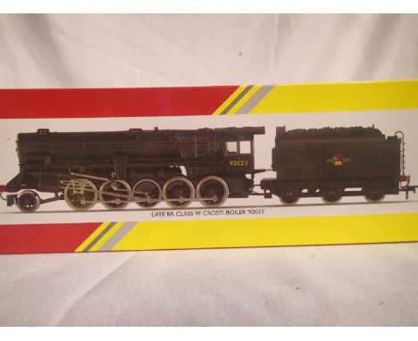 OO scale Hornby R3274, class 9F, with crosti boiler, 92023, Black Late Crest. As new, unopened, slight storage wear to box. P