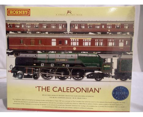 OO scale Hornby R2306 The Caledonian train pack comprising Coronation class locomotive, King George VI, plus three BR Maroon 