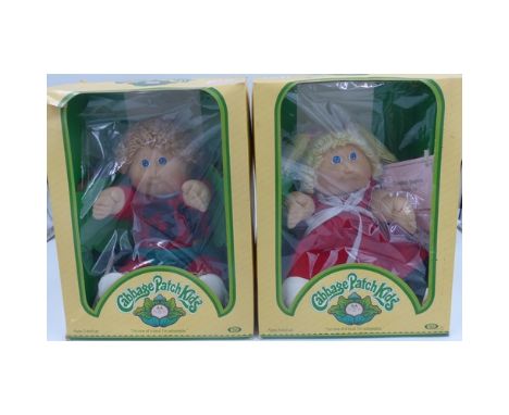 Two boxed Cabbage Patch Kids dolls. P&amp;P Group 1 (£14+VAT for the first lot and £1+VAT for subsequent lots) 