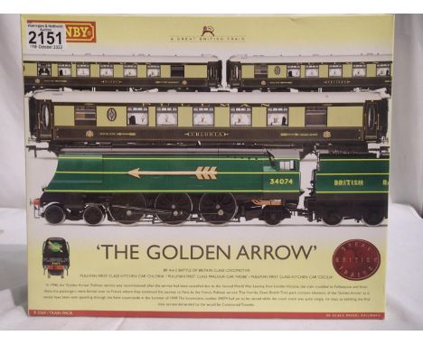OO scale Hornby R2369 Golden Arrow train pack compromising B of B class locomotive. Plus three Pullmans with lights, Chloria,